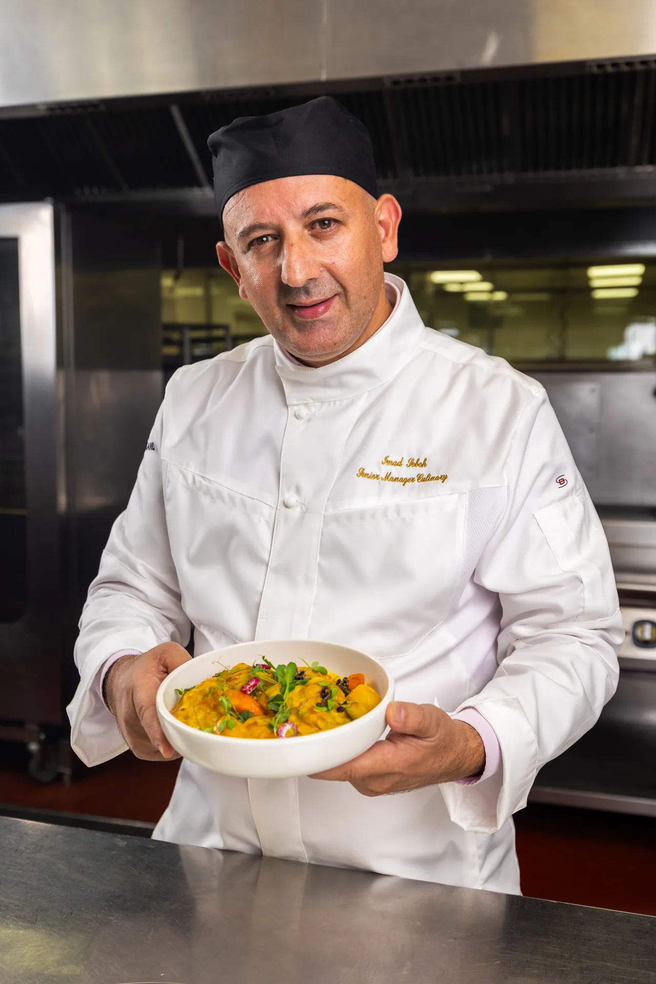 Emirati head chef with signature dish