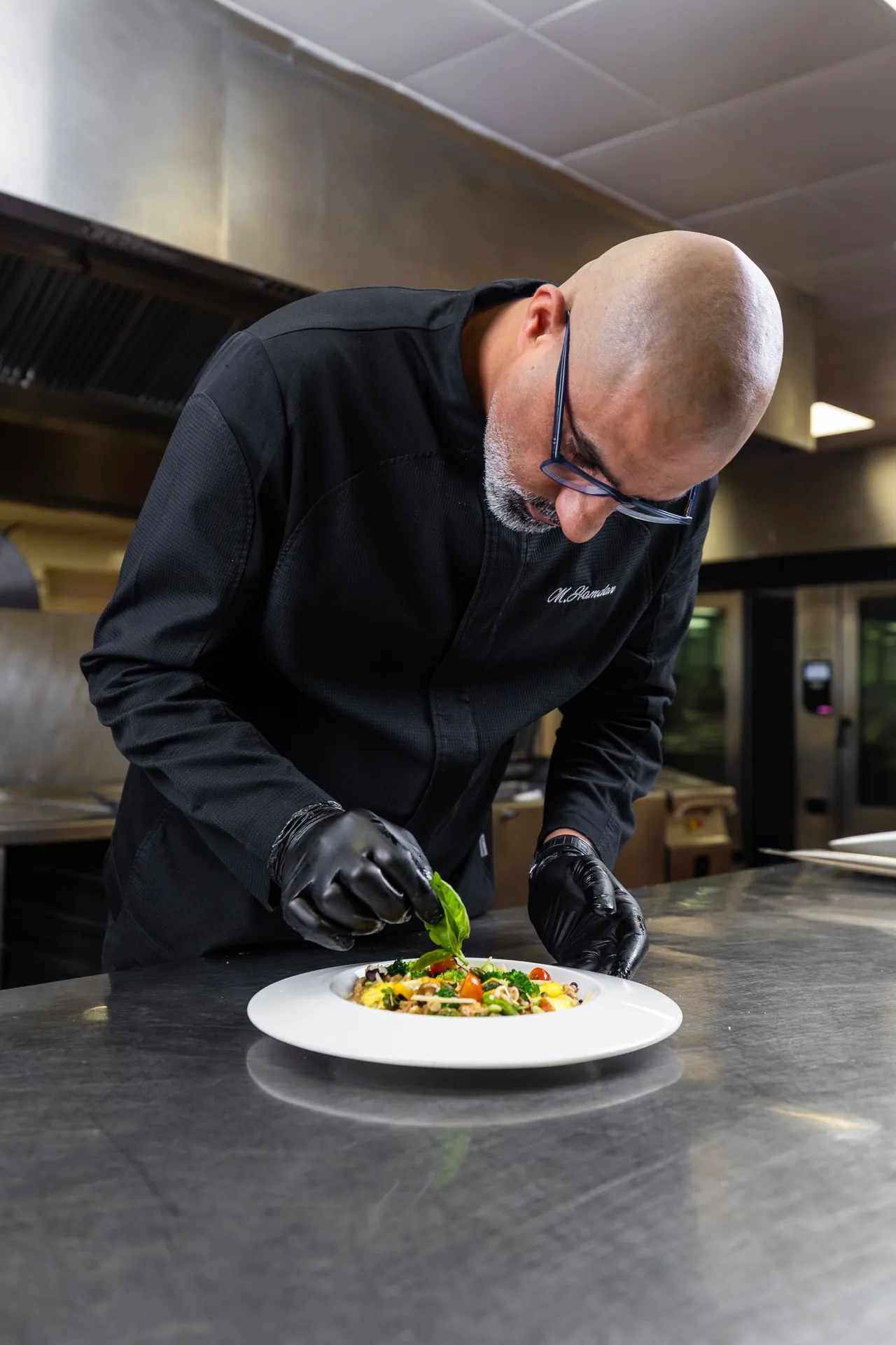 Chef plating a dish